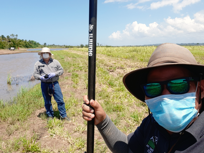 NRCS Caribbean Engineer Heriberto Rosado and Soil Con Abiud Mulero survey conservation practices in Salinas, Puerto Rico, during COVID on 16 April 2020.