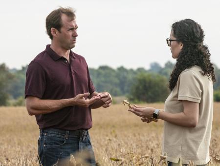 People talking a field